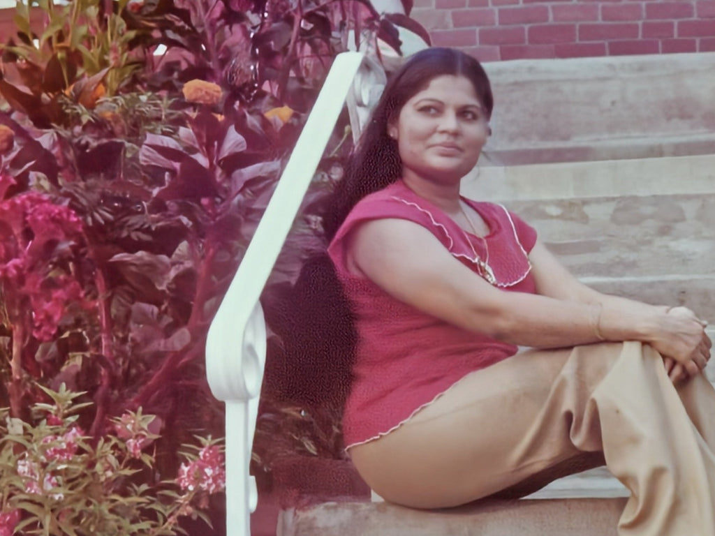 Shadoh's mother Elsie sitting on steps