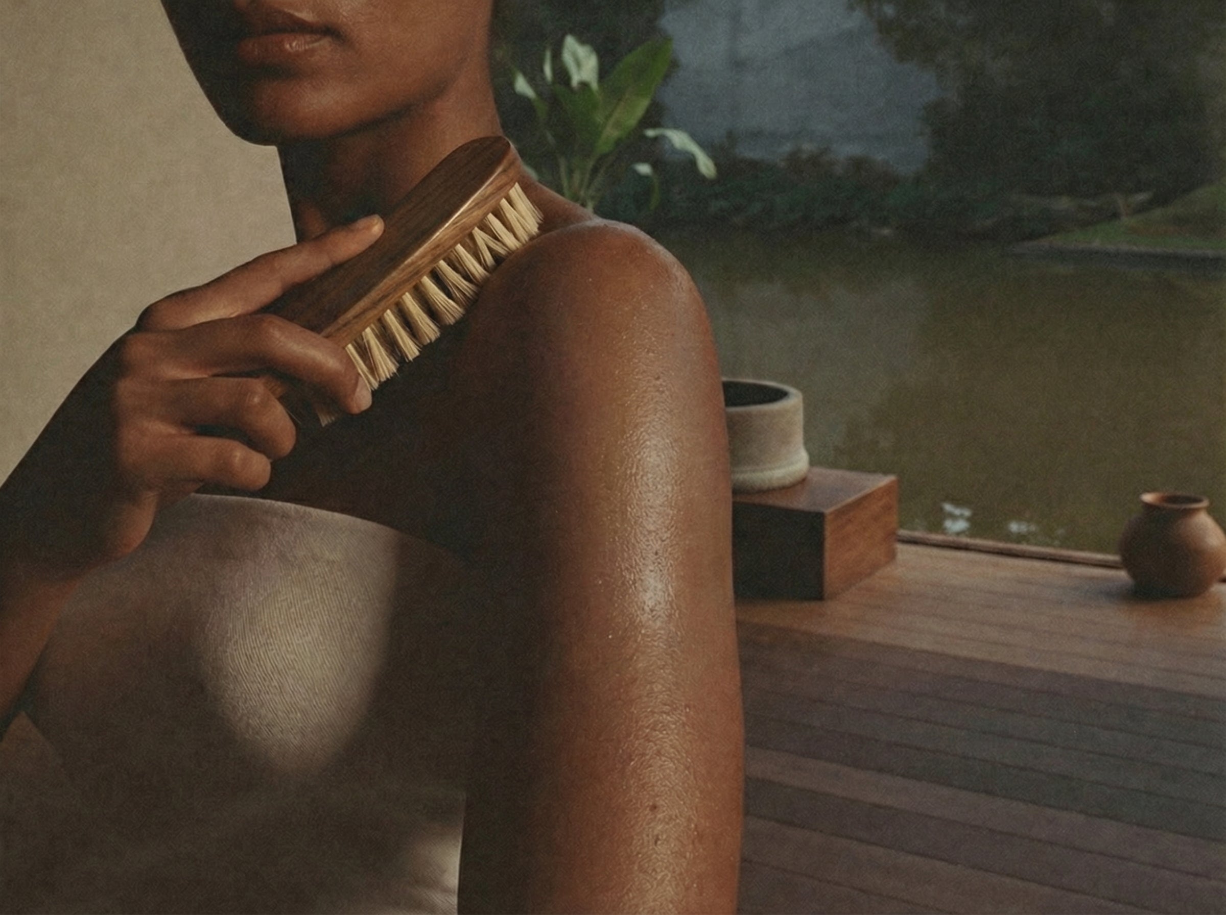 Indian woman dry brushing (garshana) for lymphatic drainage | taila ayurvedic skincare| 