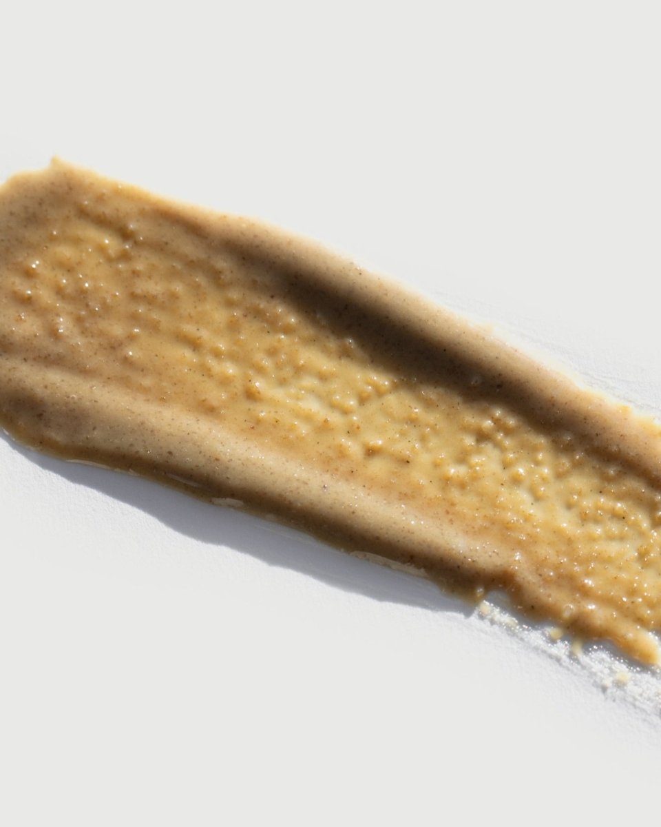 A close-up of the rich, dark, and velvety smooth botanical texture of taïla NAVA JUNGOL Mask on a clean white background.