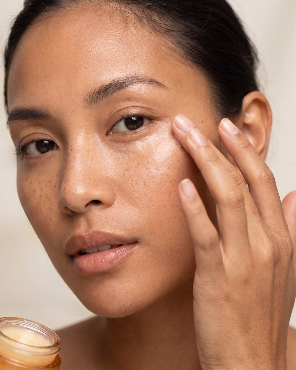 Close-up application of taila Nayana Revitalizing Eye Balm under eyes to target anti-aging concerns, dark circles, fine lines and puffiness with Ayurvedic botanicals.